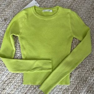 Like green, ribbed, body con top from Nasty Gal in a size M/L. Fits small!!!